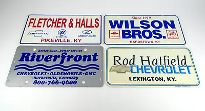 4 Car Dealership Booster License Plate Tag Chevrolet Oldsmobile Buick GMC • $15.58