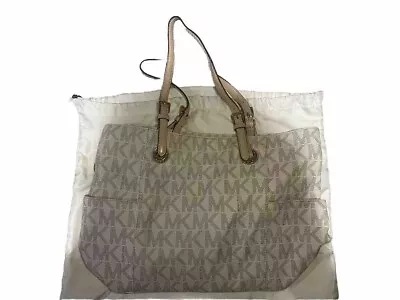  Elegant Beige Monogrammed Michael Kors Handbag With Gold-Tone Accents  • $25