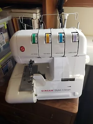 Singer  14J250 Stylist II Serger Machine W/ Accessories And Carring Bag  • $250