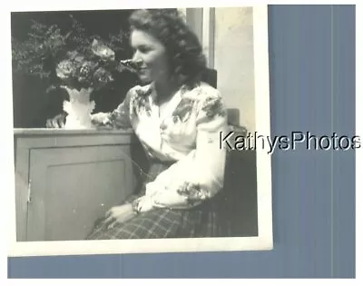 Found B&w Photo H_4370 Young Woman Looking At A Vase Of Flowers • $6.98