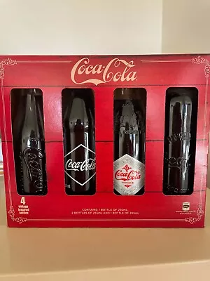 Vintage Coca Cola 4 Bottles (Never Opened) • $75