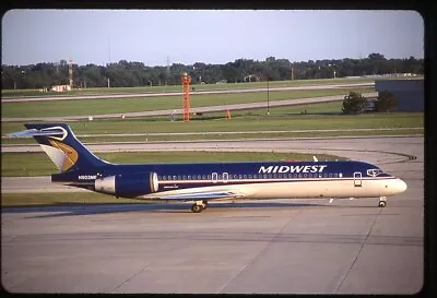 Original Airline Slide 35MM Midwest 717 N903ME At MKE 2004 • $2