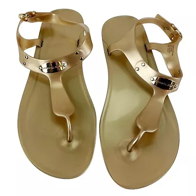 Michael Kors Jelly Sandals Womens Sz 10M Gold MK Plate Flat Buckle Up Thongs PVC • $49.99