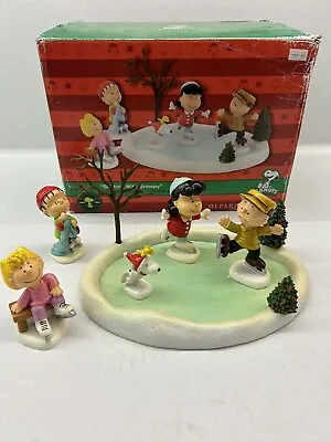 Department 56 Peanuts Christmas Skating With Snoopy Figurine Set • $94