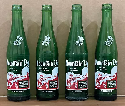 Lot Of 4 Vintage Mountain Dew Bottles W/ Unique Names Under The Word “Mountain” • $30