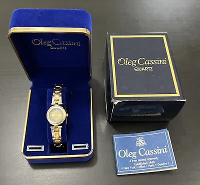 Vintage Ladies’ Oleg Cassini Quartz Watch Gold Silver Band Bezel Stainless Steel • $82.45