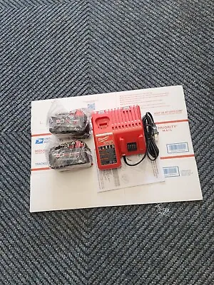 ( 2 ) 3.0ah Milwaukee 48-11-1828 M18  Battery With 48-59-1812 Charger • $129