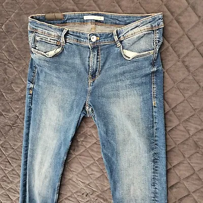 Zara Trafaluc Blue Denim Mid Waist Jeans Size 12 Stretch Raw Hem Reg Wash • $21.99