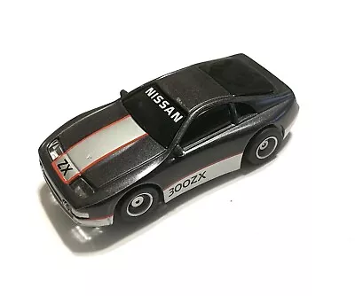 TYCO HP7 CHASSIS NISSAN 300ZX  CHARCOAL GRAY SILVER HO SLOT CAR No. 6906￼ RUNS • $34.95