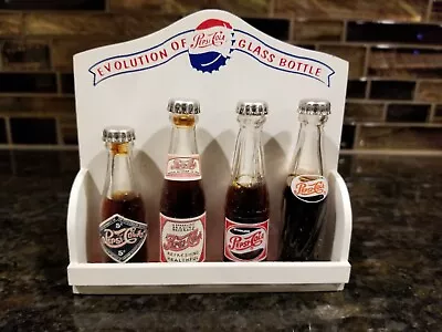 Vintage Miniature Pepsi Cola EVOLUTION OF PEPSI COLA GLASS BOTTLES Display Rack • $59.99