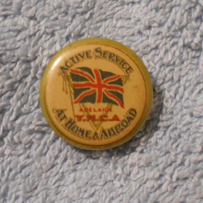 #D341.  WWI  22mm ADELAIDE YMCA TIN BADGE - ACTIVE SERVICE AT HOME & ABROAD • $40