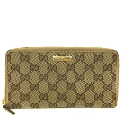 $1 • Buy GUCCI GG Logo Canvas Zip Around Long Wallet /1J1688