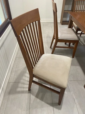 $200 • Buy 8 Solid Timber Dining Chairs With Cream Cushions