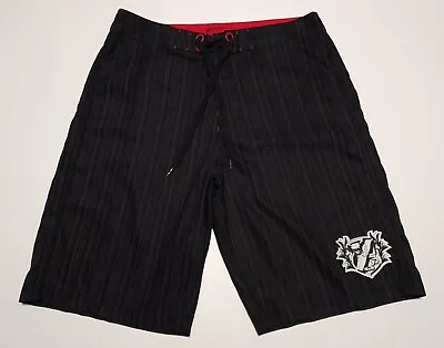 2008 Oakley Scatter Skull Black Stripe Surf 36 Board Shorts • $26