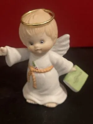 Enesco Ruth Morehead Holly Babes 1991 Angel With Music Book In Hand • $5.99