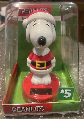 Snoopy Solar Bobbler Peanuts Christmas Santa Claus Car Bobble Head • $6