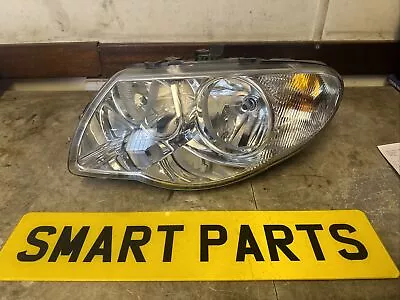 Chrysler Voyager Passengers Side Headlight 04857833AC • $43.50