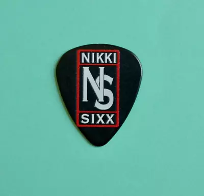 SUPER RARE MOTLEY CRUE NIKKI SIXX Stadium Tour 2022 Red GUITAR PICK • $35