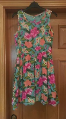 Miss Evie Floral Dress Age 11 Aqua Blue Background • £6