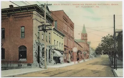 Laminated Reproduction Postcard Mount Pleasant PA Main Street Showing Bank • $5.95