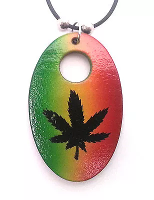 Threaded Necklace With A Rasta Color Pendant With A Herb Leaf Design • $7.99