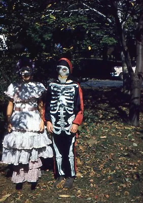 H033 35mm Slides 1961 Kids In Halloween Costumes Skeleton & Old Time Dress • $4.99
