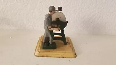 Vintage West German Fleishmann   Pressed Steel Man Grinding Stone  Steam Toy  • $45