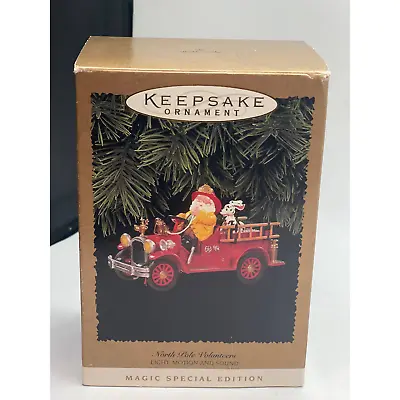 1996  Keepsake Ornament Fireman Firetruck Light Motion North Pole Volunteers • $14.99
