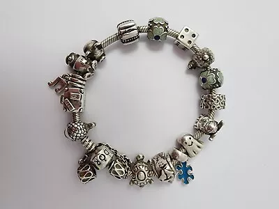 Pandora Sterling Silver Bracelet Set With 17 Charms • $395