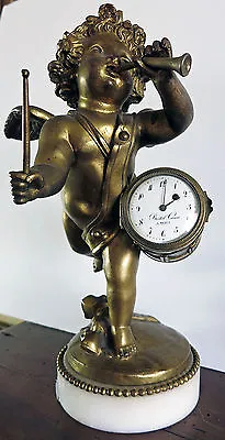 Early 19th Century  Antique Bronze Clock With Cherub Playing A Drum And Trumpet • $1999