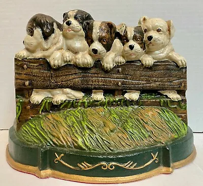 Vintage Cast Iron Door Stop Of Puppy Dogs On A Fence • $45