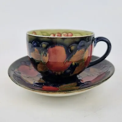 Early Moorcroft Pottery Cup And Saucer With Pomegranate Pattern • £295