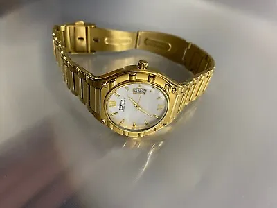 $120 • Buy Daniel Steiger Men's Broadway Gold 3301G-M 18K Fused Gold Stainless Steel Watch