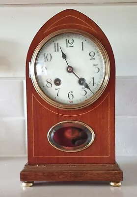 An Edwardian Inlaid Lancet Shaped Mantel Clock • £50