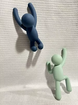 Umbra-Alan Wisniewski Design-Blue/Pastel Green-Climbing Men-Wall Buddy Hooks • £12.64