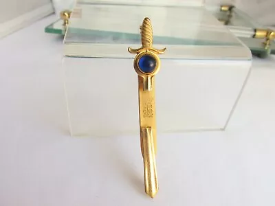 Vintage ANSON Gold Tone Sword Folding Tie Bar Clip Clasp Hilt W/ Blue Stone  • $20