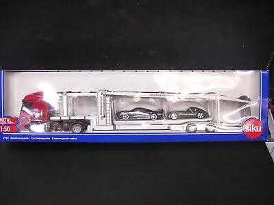 Siku 1:50 DieCast Car Mercedes Actros Kassbohrer Transporter With 2 Cars #3934 • $49.99