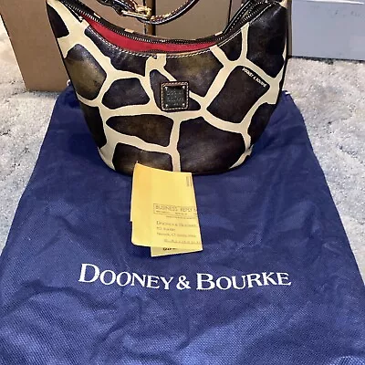 Dooney&Bourke Giraffe Handbag With Registration Number Form • $15