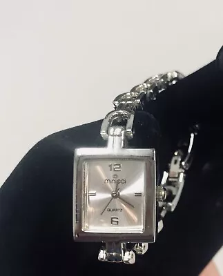 Minicci Silver Stainless Steel Round Woman's Watch Model 25186 Needs Battery 7.5 • $19.99