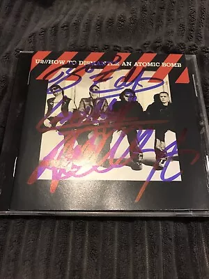 $140 • Buy U2 Signed Cd