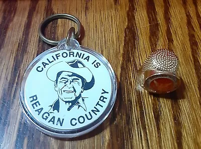 Ronald Reagan Key Chain And Richard Nixon Thimble Both In Excellent Condition.  • $6.99