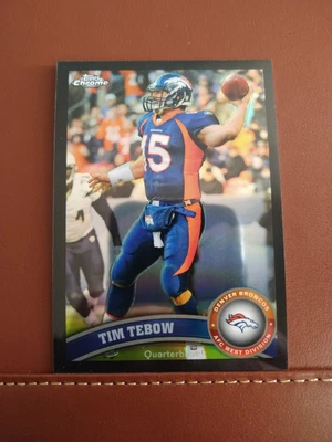 $10 • Buy 2011 Topps Chrome Black Refractor Tim Tebow #92/299