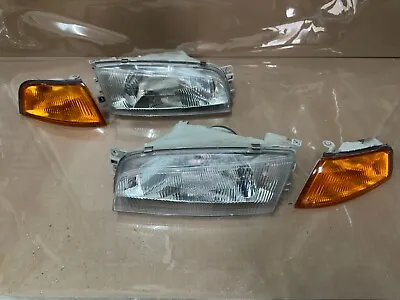 Mitsubishi Colt Lancer CK1A Front Head Lights Corner Lamps 1 SET 95-98 (No Good) • $189.91