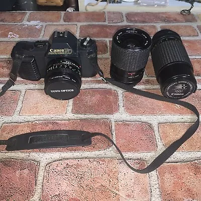 Canon T50 35mm Camera With Extra Lens Olympics Cap And Manuals. • $35