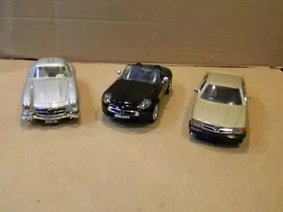 3 Die Cast Vehicles Burago 2 Mercedes &  Motormax Black BMW Z8  1/24 Scale • $9.99