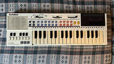 Casio PT-80 Mini Electronic Keyboard  With RO-551 World Songs ROM • $75