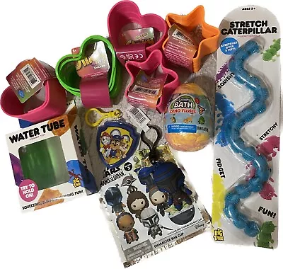 Kids Toy IncludesSlinkiesStretch CaterpillarWater TubeStar Wars Bag ClipDino • $23.94