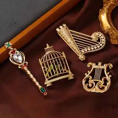 Vintage Baroque Matte Gold Color Series Scepter Birdcage Brooch Fashion Pin  • $6.29