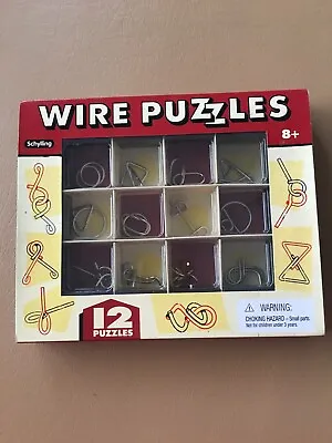 EUC 12 WIRE PUZZLES Brain Teaser Mind Game Toy Steel Metal IQ Test Magic Trick • $9.88