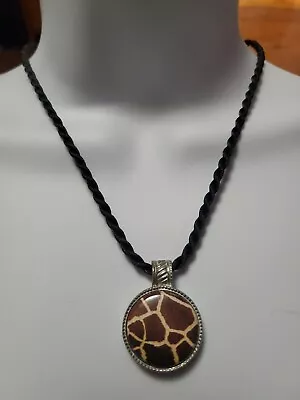 MAGNABILITIES Silvertone Giraffe Print Pendant On 18  Black Rope Chain. • $19.99